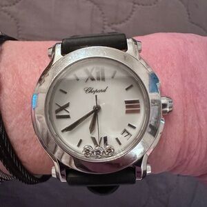 Chopard Happy Sport 3  diamonds woman’s watch. 3 floating diamond’s.